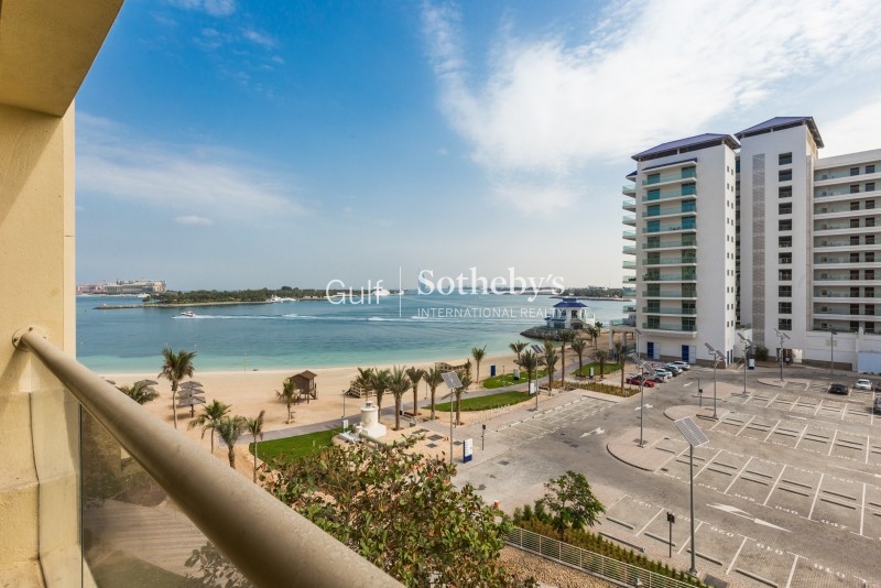 Vacant Beach Facing Shoreline Burj View